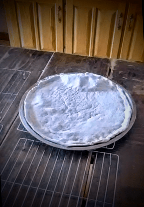 ...but was not pricked before baking. The large air pocket may crack open during the topping process...but shouldn't matter a great deal.