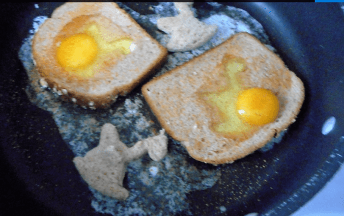 Fry the cut-out pieces, too! I almost forgot about the pieces I cut out, but then I placed them on the butter next to the toast.