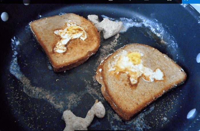 If the butter on the toast shows browning, it's time to flip the entire piece over and cook the other side.