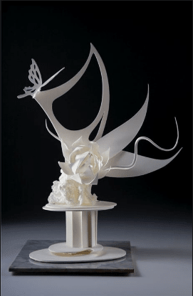 Pastillage dries rock hard and is used for breathtaking centerpieces or sturdy structures for your cakes.