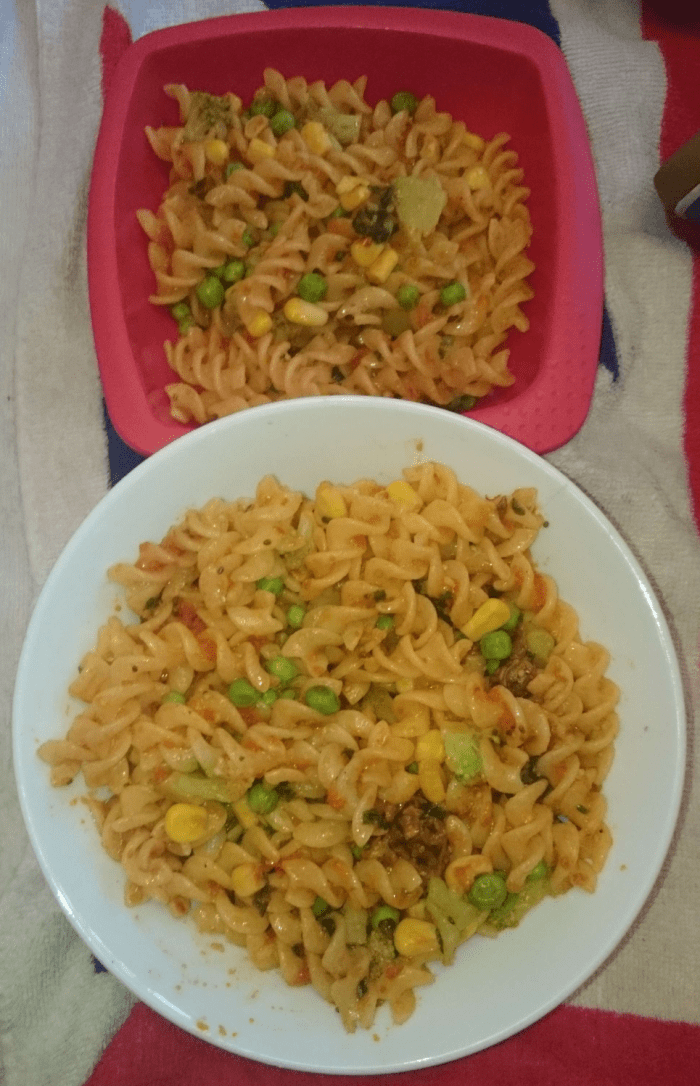 Gluten-free vegan pasta with vegetables (my son's plate on top, mine on the bottom).