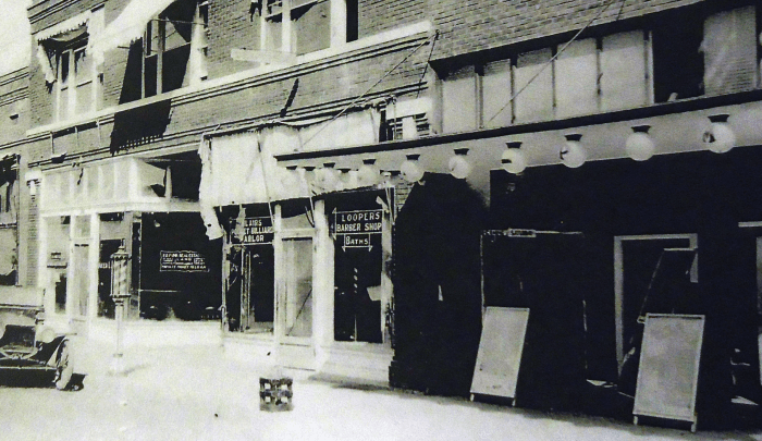 The Comet Vaudeville Theater (to the left) and the Victory Theater (to the right) in downtown Poteau