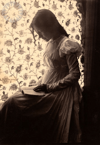 "Zitkala-Sa" reading by windowlight; "Zitkala-Sa" in pencil on verso ..Credit: Gertrude Kasebier (Smithsonian Institution)