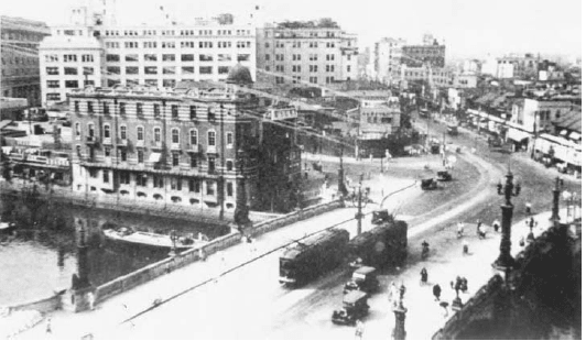 A Tokyo street scene in 1933, showing the tremendous change that Japan had experienced over the previous three quarters of a century. The uniqueness of the Meiji revolution continues to be a fascinating historical subject.