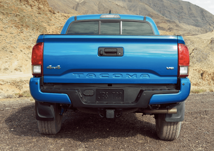 Back end of a 2017 Tacoma. Notice the factory hitch and wiring outlets. All this needs is a ball mount and ball and it's ready to go.