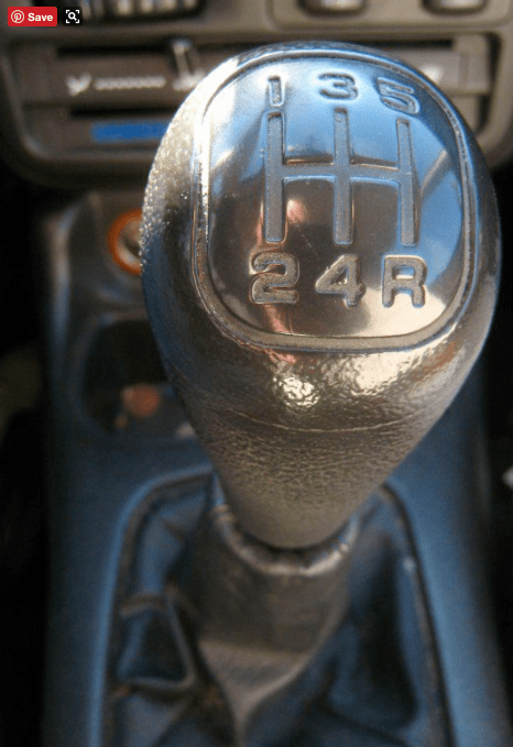 With the engine off, move the stick around. All gear arrangements are in an "H" shape, but the location of reverse varies. On this stick, reverse is to the right and down. On other stick shifts reverse is to the left and up.