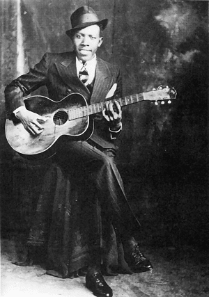 American blues singer-songwriter and musician Robert Johnson Studio Portrait Hooks Bros., Memphis, circa 1935 ©1989 Delta Haze Corporation (fair use)