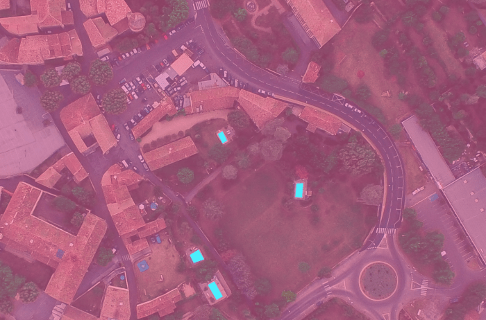 After applying deep learning techniques and training the algorithm,4 pools were classified in the image. Note that there are actually 3 pools (see original image). This means that more "training" is needed.