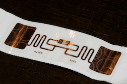 The photo shows the back side of a disposable tag used for race timing.