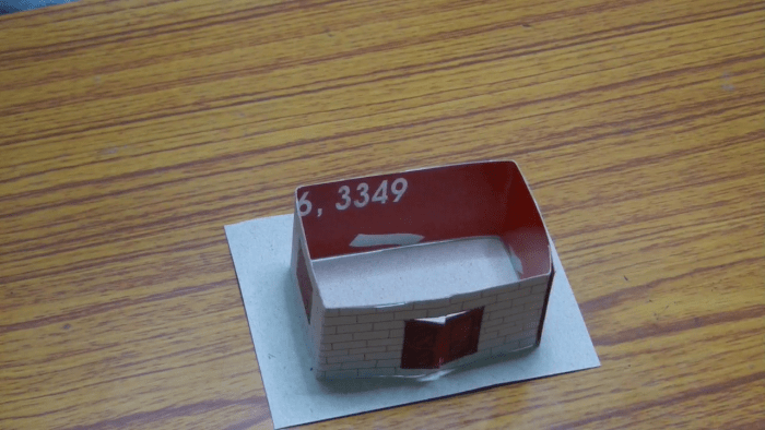 Now arrange a base for your house. It should be little bit bigger than the base of the house. You can use the same thick paper which you used to make the wall of the house.
