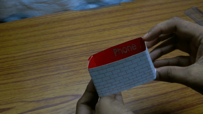 Once done you can fold the whole paper into a four sided box. This box will be the wall of your paper house.