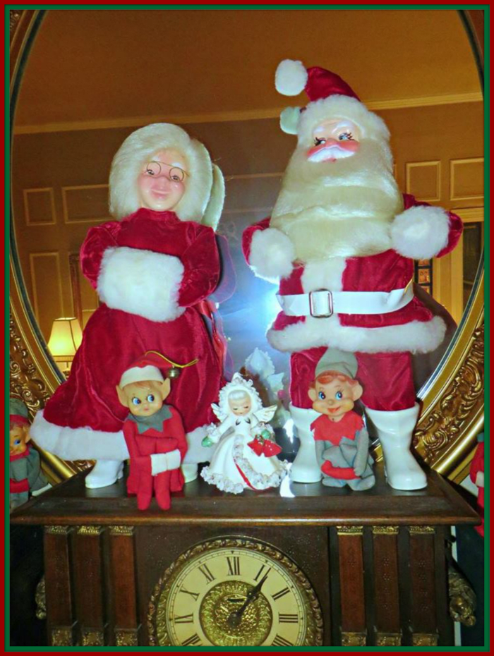 Santa and Mrs. Claus are so happy to be out of that box and over a nice warm fireplace ... These tow are so fun to display together on the mantle at Christmas time.