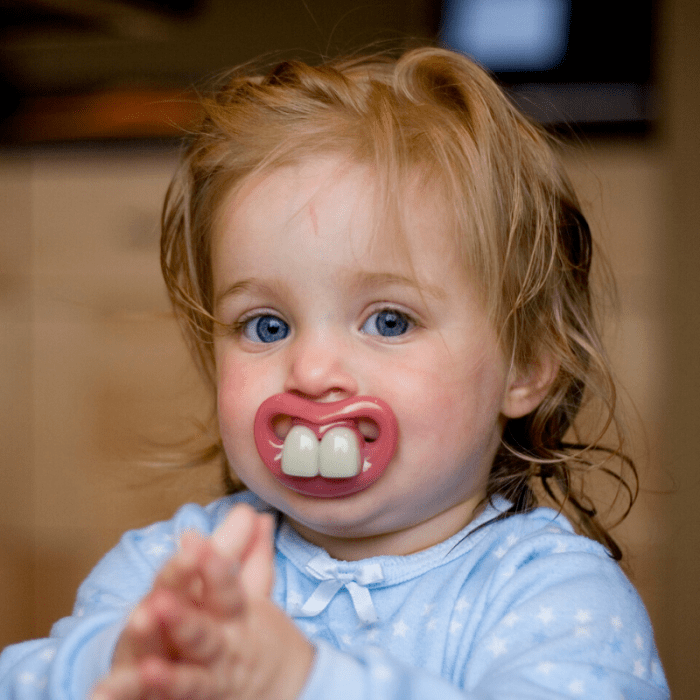 Gag pacifiers are funny and useful and make for some delightful photo opportunities. Be sure to purchase from a high-quality pacifier brand.
