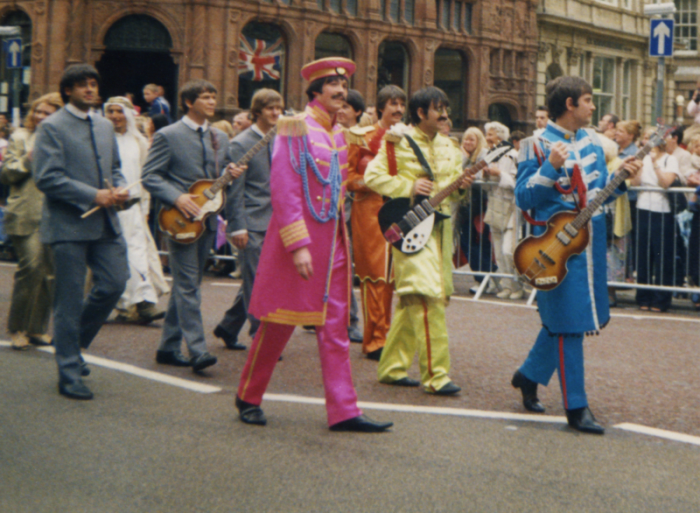 I found this picture of Beatles impersonators at a parade in Liverpool on Wikimedia and I’m a little bit in love with it. The photographer took this picture on an old 35mm film camera in the 1990s so it’s got that gorgeous retro look about it.