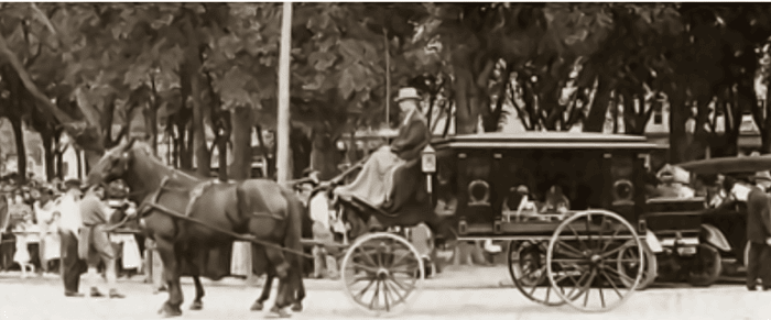 Horse drawn hearse brings Villisca murder victims to their final resting place. The interment was memorialized as the "funeral in the park".