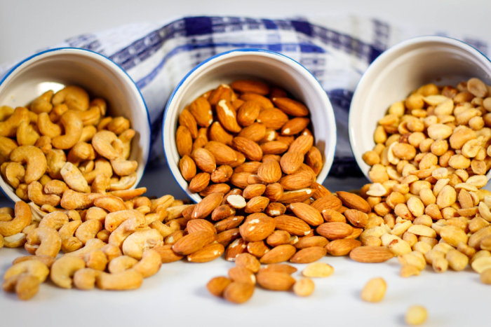 Nuts provide vitamin E and are a healthy source of fats in a vegan diet.
