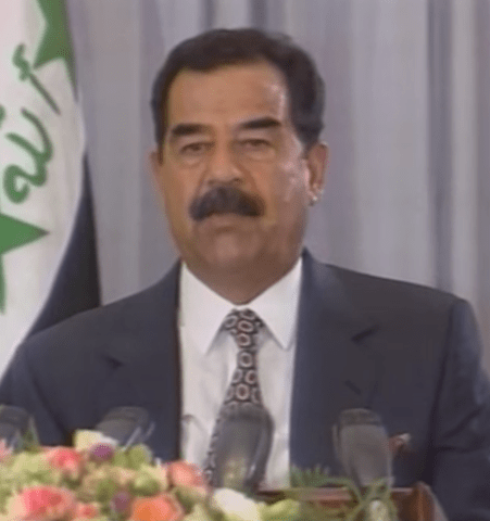 Iraqi President Saddam Hussein giving a speech about Saudi decision to allow American troops to stay in the country. 1996.