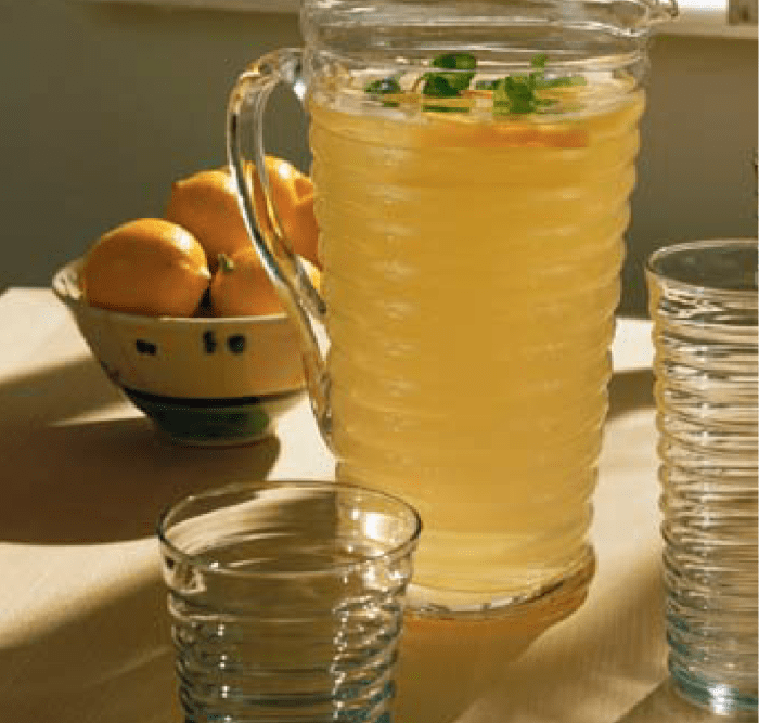 Once the pitcher was full, she added one packet of sugar-free powdered lemonade, squeezed in the juice of two lemons, then stirred in six packs of stevia.