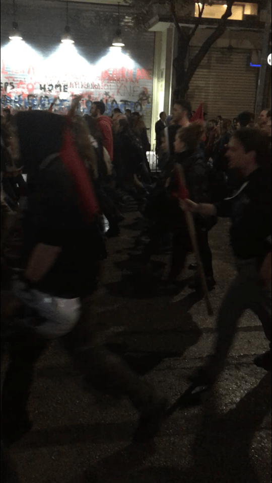 Individuals carry bike helmets for, what I hope was, self defense. This march has a reputation for ending with degrees of violence.