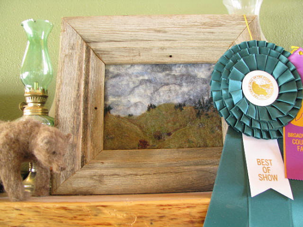 You can manipulate the wool into flat images of anything you like, including gorgeous landscapes like this one.