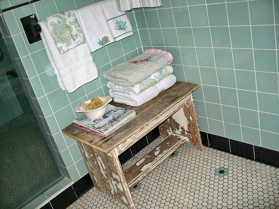Typically shabby chic style - The look and feel of this old and worn-looking bathroom is characteristic of the distressed look of shabby decor.