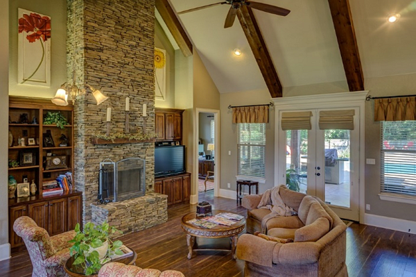 Beautiful interior that'll be a dream to live in. Notice the stone works, vaulted ceiling, and the classic wood floor. There is a blend of the traditional and contemporary.