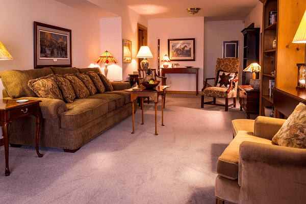 A classic interior with its rich hues, subdued lighting, and warm cosy feel. This dream home's interior is for those who love a more traditional themed interior.