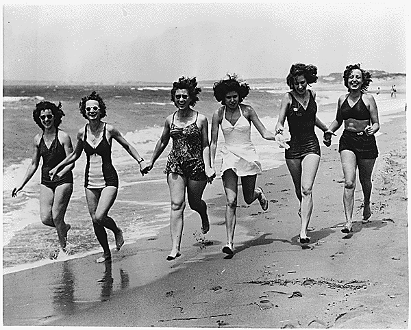 Women in the 1940s. Image source:http://upload.wikimedia.org/wikipedia/commons/2/2b/Women_in_Bathing_Suits_North_Africa_1944.gif