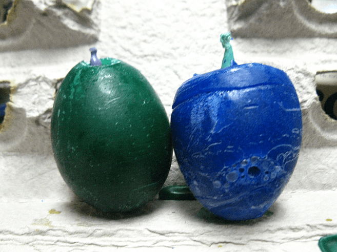 the candles together- the green looks just like the ones I remember making- the blue could have used a little more wax.
