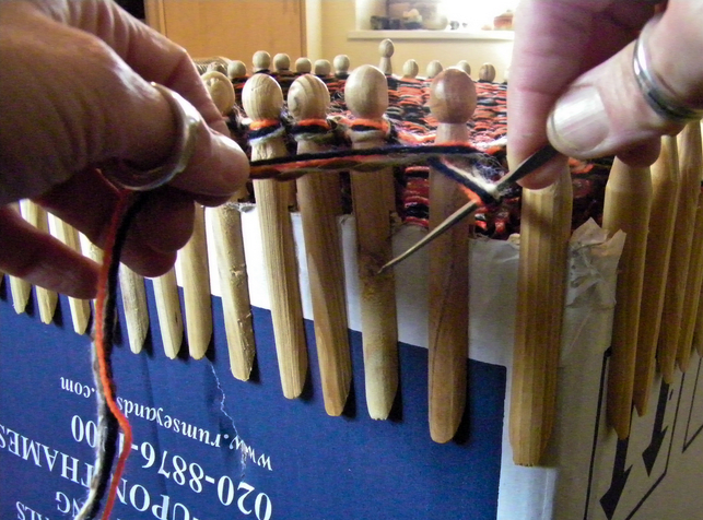 You can always construct your own loom in exactly the size you want - this example uses a cardboard box and clothes pegs!