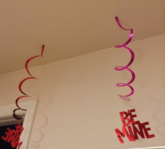 Don't have a lot of money for Valentine's Day? A homemade gift and simple decor from the party store can make for a romantic holiday without spending too much!