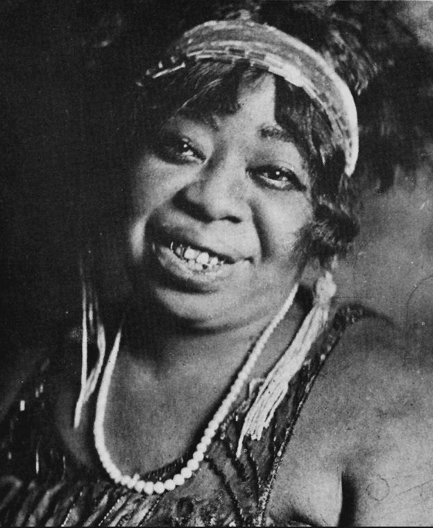 Often performing on Beale Street, "The Home of the Blues," in Memphis, Tennessee, Ma Rainey was known for her music and brawling. She was also said to be a practitioner of Hoodoo magic.