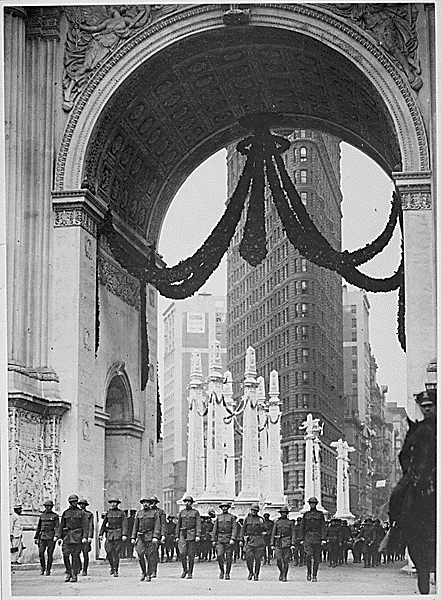 Donovan and the 165th passing under the Victory Bridge -his image is a work of a U.S. military or Department of Defense employee, taken or made as part of that person's official duties. As a work of the U.S. federal government, the image is in the pu