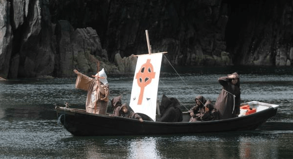 Students of Scoil Baile 'n Fhirtear (Ballyferriter School) recreating St. Brendan's voyage from Brandon Creek in 2010.