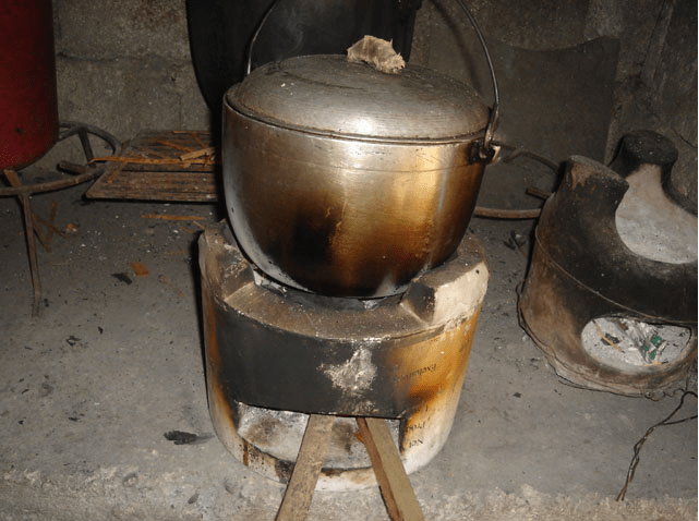 Rice is boiled inside a covered pot with enough amount of water until cooked. (Image Credit: Photos by Jun Verzola and Brenda Dacpano/NORDIS from galleries.nordis.net)