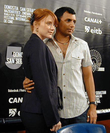 Bryce Dallas Howard and M. Night Shyamalan promoting movie The Village at the San Sebastian Film Festival in Spain.