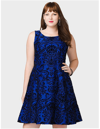 plus size fashion doesn't have to be boring, this simple velvety electric blue cocktail dress with black scroll pattern is guaranteed to dazzle