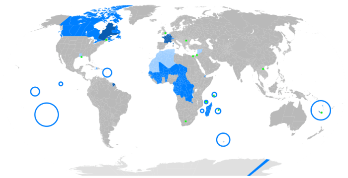 Legend: Dark blue is maternal language, blue is official language, light blue is secondary language, and green is minority language.