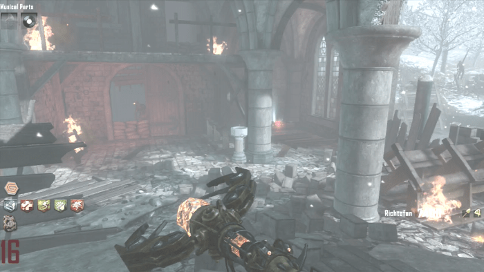 The Holy Water Basin is next to the pole, in the corner with the Staff of Fire Symbols.
