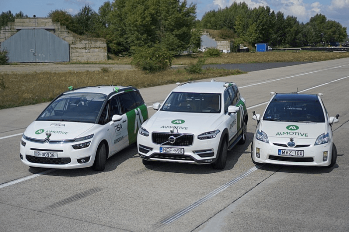 Shown above are three AImotive test vehicles, including (from left) a Citroen C4 Picasso, a Volvo XC90 and a Toyota Prius.