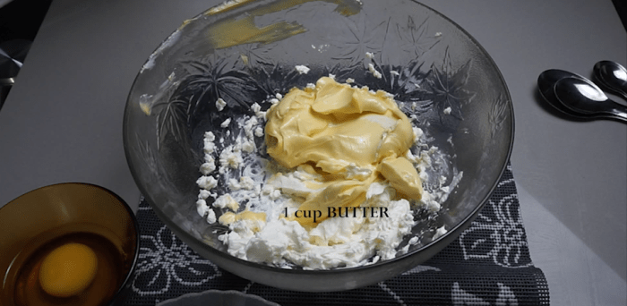 Beat cream cheese and butter on a low setting for a bout 60 seconds until light, softend, and mixed.