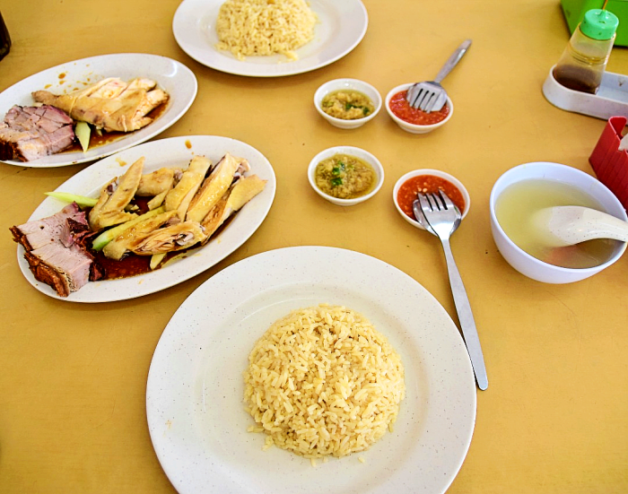 Both friends ordered the same plates of chicken rice. Steamed chicken and Roast Pork with rice.
