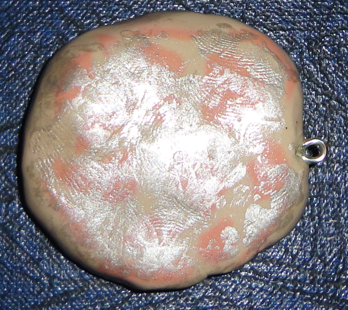 If you paint over the project with acrylic paint once it's cooled, brush on the Varathane when dried. It not only protects the piece, but as with this pendant here, the metallic paints that are just dabbed on show their effects.