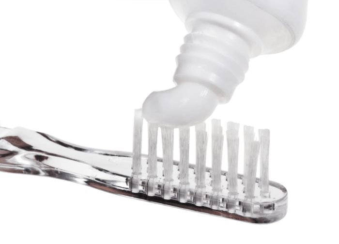 Dip your toothbrush into some hydrogen peroxide, add toothpaste and then add baking soda. If you do not want to use toothpaste, you do not have to. Simply, put baking soda on your toothbrush and brush.