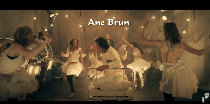 The "Do You Remember" music video has everything. Ane Brun singing, dancers in whimsical clothes, people banging drums, and a very confused man in a bed.