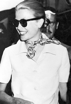 Grace Kelly sporting another great use of a fashionable scarf - a casual neck scarf