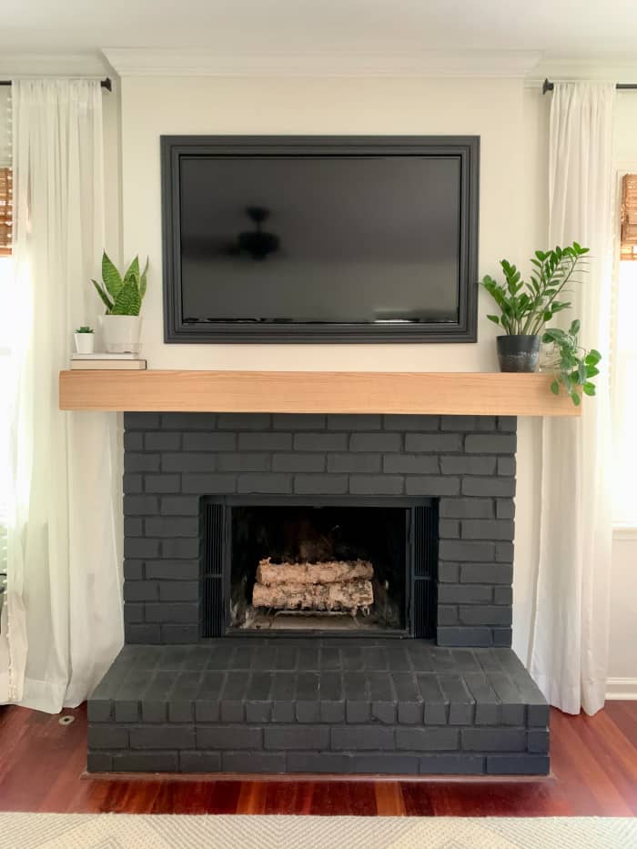 How I Painted My Brick Fireplace Black in 3 Easy Steps - Dengarden