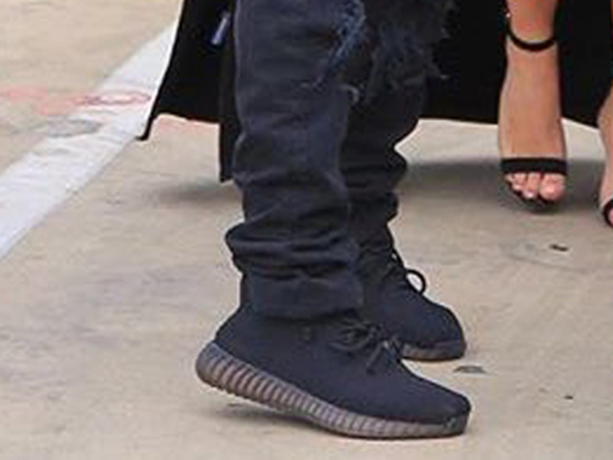 yeezy triple black on feet
