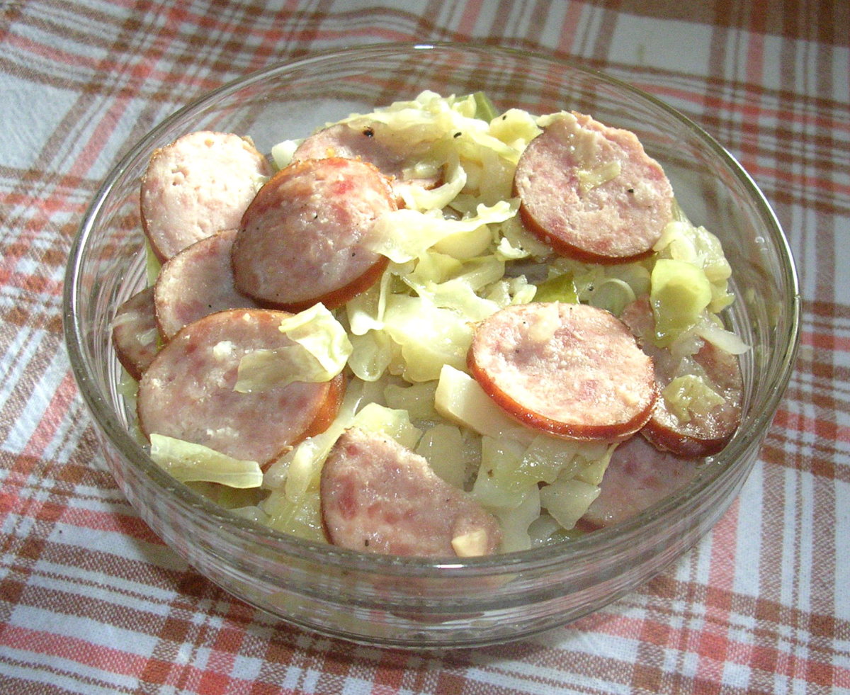 A bowl of delicious kielbasa and cabbage made in our Polish family's kitchen.