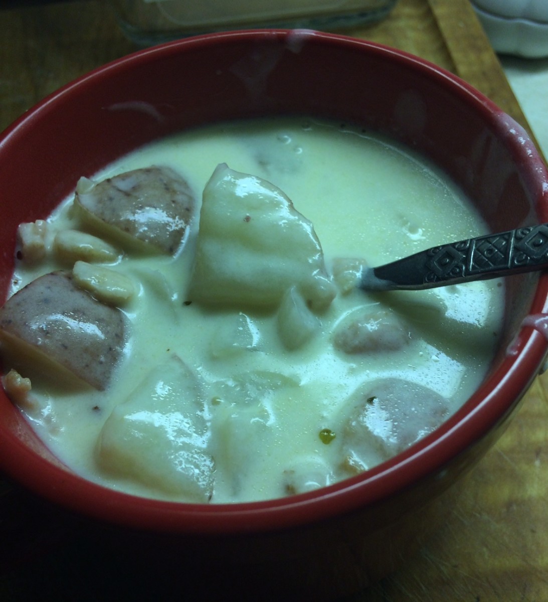 A bowl of creamy potato bacon soup.